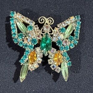 Julianna Butterfly Brooch Pin with Green and white Rhinestones.